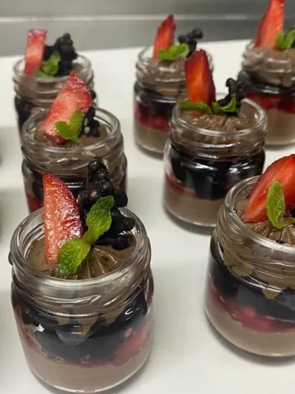 Life is short, eat the dessert first. Our chocolate and berry mousse jars are layered with rich chocolate, fruit compote, and fresh strawberries.