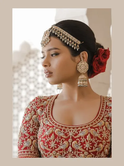 A regal bridal portrait in Jaipur, highlighting the intricate details of her Abu Jani Sandeep Khosla lehenga. I take great care in creating stunning portraits that celebrate the bride's elegance and the artistry of her attire.