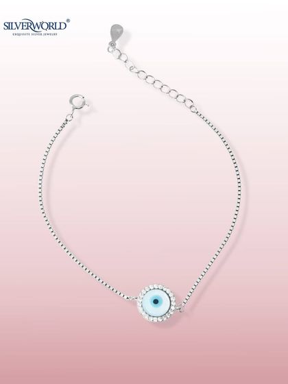 Stay protected in style with this classic Evil Eye bracelet. The iconic light blue charm is framed by sparkling Zirconia and set on a sterling silver box chain, making it a beautiful and meaningful accessory.