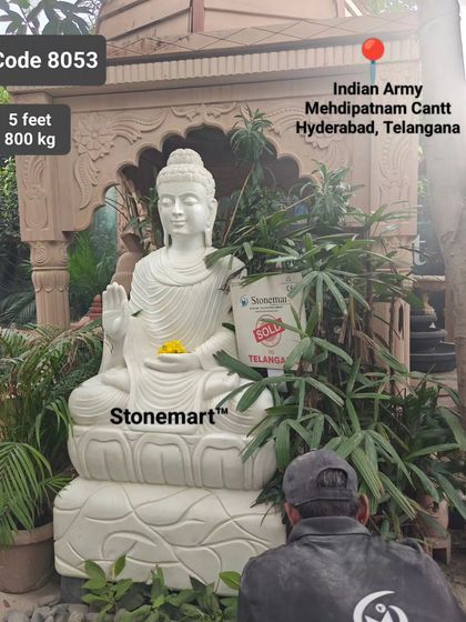 An artisan puts the finishing touches on the 5-foot Buddha statue before its dispatch to the Indian Army cantonment in Hyderabad, Telangana.