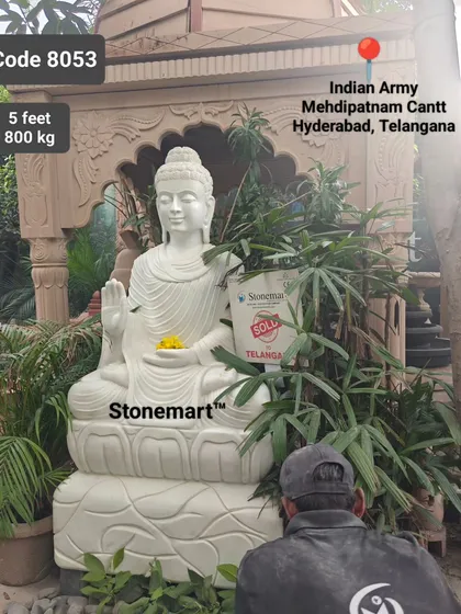 An artisan puts the finishing touches on the 5-foot Buddha statue before its dispatch to the Indian Army cantonment in Hyderabad, Telangana.