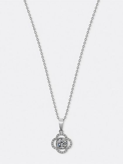 A silver necklace with a crystal clover pendant, shot on a pure white background for a clean, crisp look suitable for any online store.