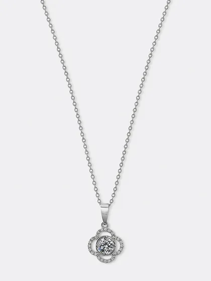 A silver necklace with a crystal clover pendant, shot on a pure white background for a clean, crisp look suitable for any online store.