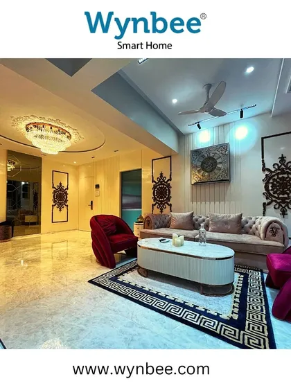 In this luxurious living room, I used a combination of a grand chandelier, recessed spotlights, and wall sconces to create the perfect ambiance. All lighting is fully automated and controllable to suit any occasion.