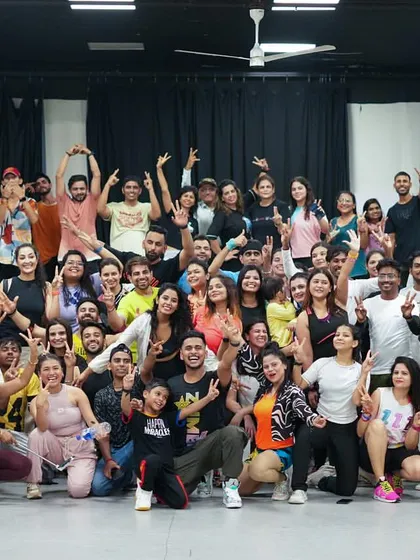 The amazing energy of a full house at my Zumba fitness party. Bringing a huge community of dance lovers together is what I live for, and I can create this same vibe for your large group celebration.