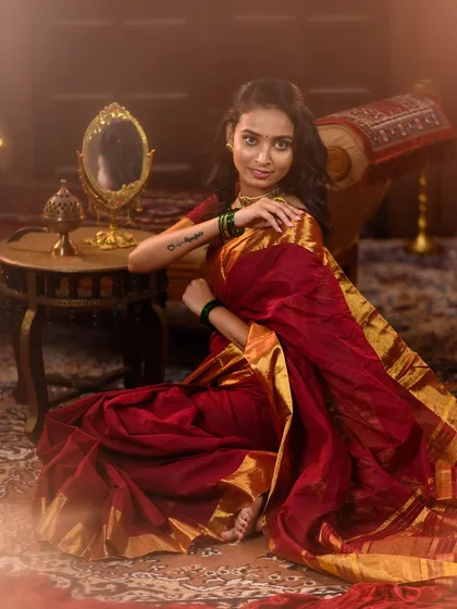 A full-length portrait in a traditional setting, complete with vintage furniture and props. This setup is ideal for creating a narrative and telling a story through the image.