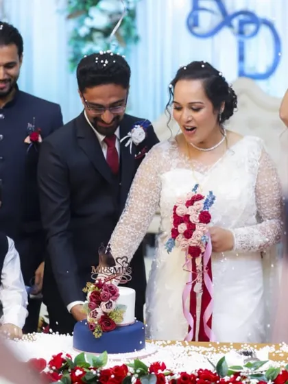 Another shot of the beautiful couple and their wedding cake. Pure happiness!