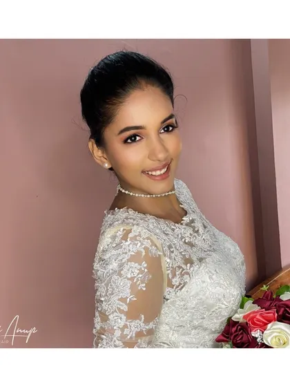 For my Christian brides, I create elegant and timeless looks. This style features soft, glowing makeup and a clean, polished finish that beautifully complements a classic white wedding gown, ensuring a radiant and angelic appearance.
