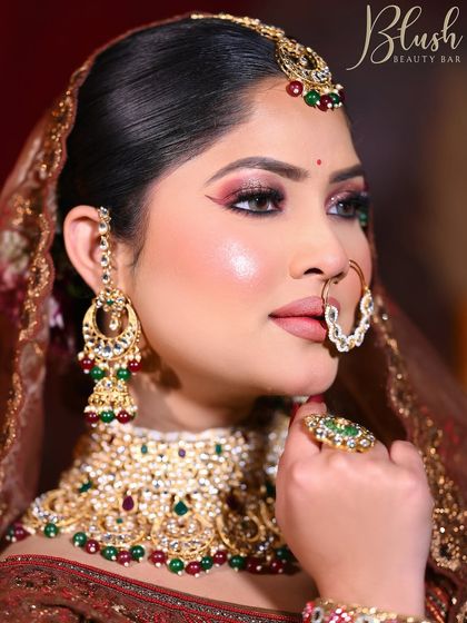 A radiant bridal glow is essential. This profile view showcases the seamless highlighter and blush application, creating a healthy, glowing-from-within look that photographs beautifully.