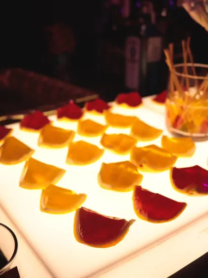 A tempting tray of colorful jello shots. They are easy to grab and a fun way to get the party's energy up.
