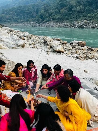 A sacred Hawan (fire ceremony) on the banks of the Ganga. We gather around the fire to set intentions, release what no longer serves us, and connect as a community.