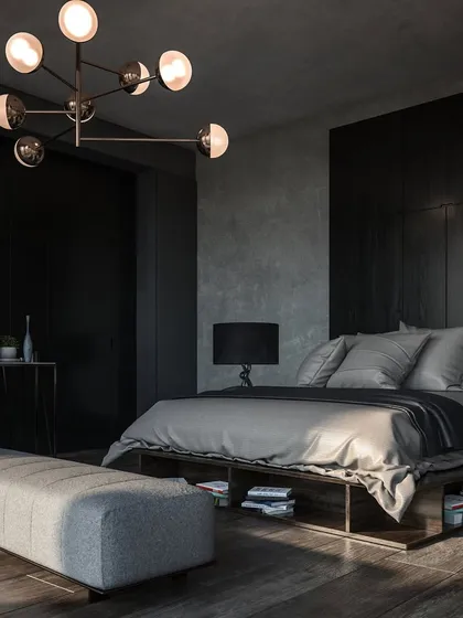 This moody and dramatic bedroom design showcases our ability to create intimate, personal retreats. We use dark wall paneling, layered textiles, and sophisticated lighting to craft a space that feels both luxurious and deeply restful.
