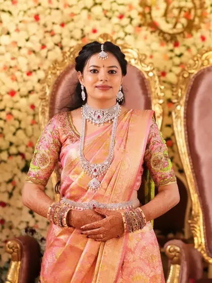 Yashwini's reception look was all about elegance. I paired her stunning pink and diamond ensemble with clean, sophisticated makeup, focusing on a flawless base and soft features to create a regal and timeless appearance.