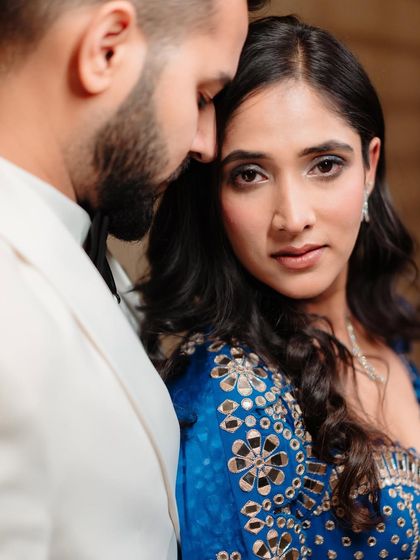 A beautiful couple's portrait. The makeup is designed to look soft and romantic in professional photos.