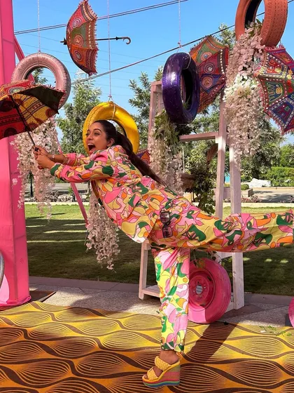 How do I stay fit? By doing yoga in heels amidst a crazy, colorful carnival-themed show. I'm always ready to jump into the theme and have fun with it.