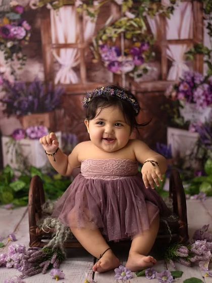 This little darling was a dream to photograph. Her happy smile and chubby cheeks are the highlight of this beautiful floral sitter session.