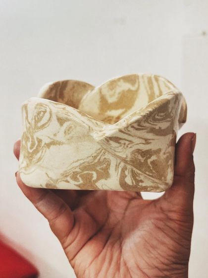 This student explored all four major techniques in her beginner's course, creating these beautiful pieces, including a delicate pierced vase and a little house luminary.