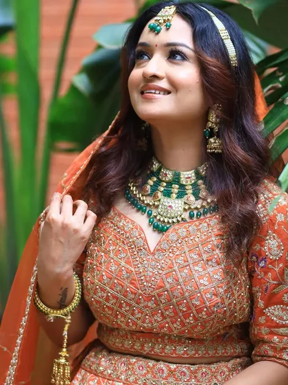 The bride looks up, radiating happiness and confidence.