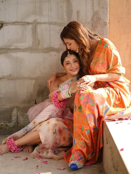 A warm and affectionate moment with Nyra Banerjee. Creating a comfortable and positive atmosphere is key to a successful shoot.