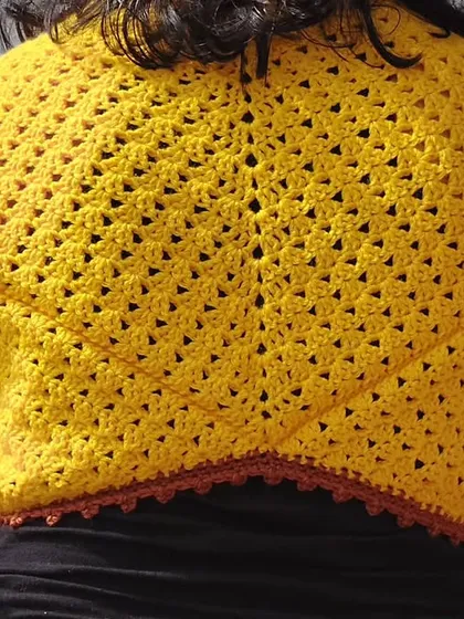 The back of the Odette Cardigan is constructed from two granny squares, creating a unique diamond shape.
