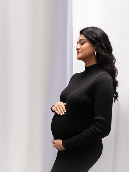 Using the studio architecture, this corner shot in the black dress creates a modern, minimalist feel with interesting lines and soft light.