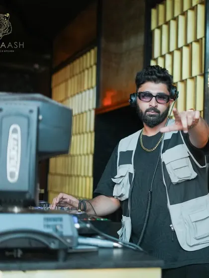 Pointing to the crowd at Badmaash, connecting with the people on the dance floor.