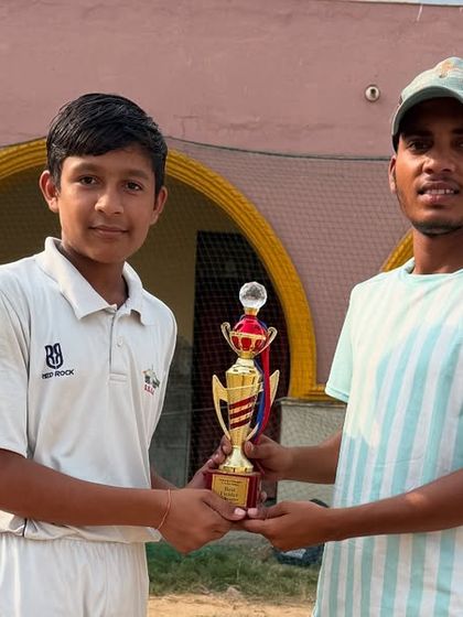 Prateek receiving the best bowler award for his excellent spell in the final match. He has a bright future as a fast bowler.