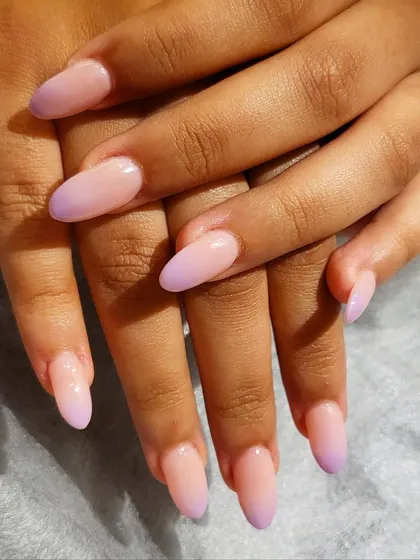 A beautiful example of a vertical ombre, blending from a soft nude into a lovely lavender shade. This is a modern and subtle way to wear color.