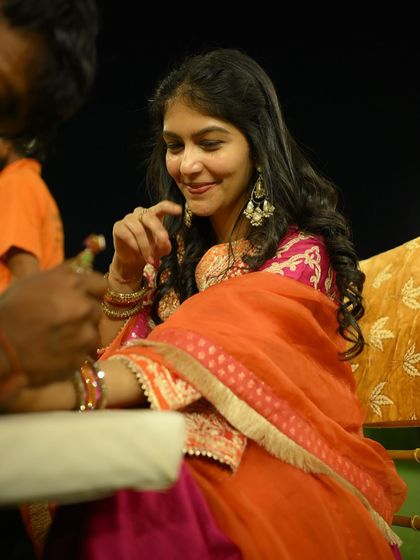 Candid moments are the best. Here I am getting my mehendi done in a vibrant, easy-to-wear suit that allows for comfort without sacrificing style.