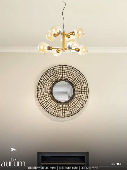 This modern sputnik-style fixture with amber glass globes casts a warm, inviting glow. It's a stylish piece that I find works beautifully as a central fixture in a living room or entryway, adding a touch of mid-century charm.
