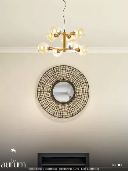 This modern sputnik-style fixture with amber glass globes casts a warm, inviting glow. It's a stylish piece that I find works beautifully as a central fixture in a living room or entryway, adding a touch of mid-century charm.