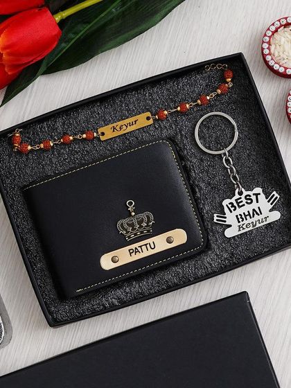 A classic Rakhi gift combo for your brother. This set includes a personalized men's wallet, a "Best Bhai" keychain, and a custom name Rudraksha rakhi.