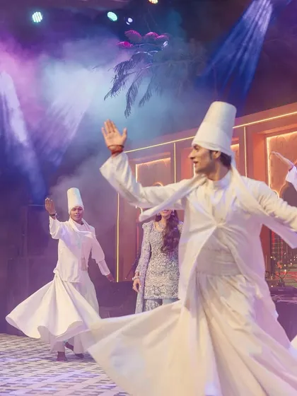 The 'Midnight Marrakesh' event came alive with soulful performances, including these mesmerizing whirling dervishes. Entertainment is a key part of the vibe, and we ensure the decor provides the perfect stage for it.