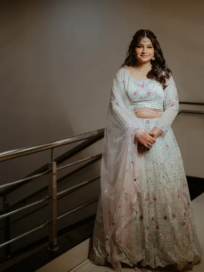 Another full-length portrait of the bride, looking poised and beautiful.