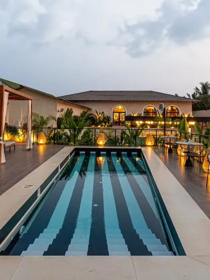 This dusk shot of the poolside lounge at Vamos Experience shows my ability to work with ambient and architectural lighting. I balanced the fading natural light with the warm glow from the cabanas and pool to create a serene and luxurious resort atmosphere.