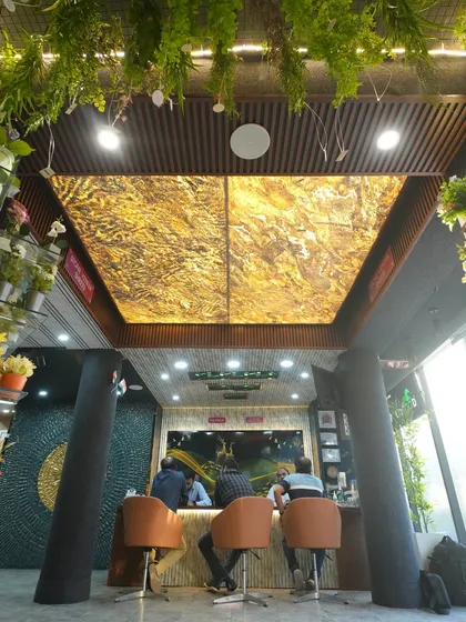 A stunning view of our backlit alabaster sheet ceiling, which creates a luxurious golden glow. This is a premium option for a high-end look.