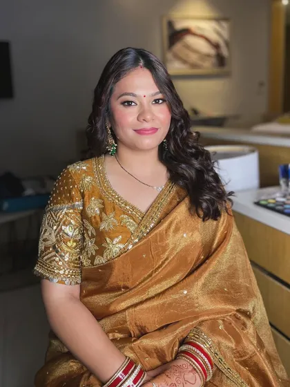 Golden hour glow. This beautiful client from a Thailand wedding looks radiant in her golden saree and matching makeup.