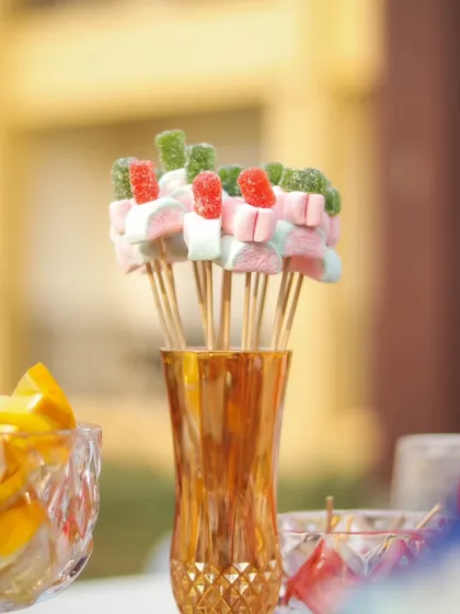 Sweet details on the bar. These candy and marshmallow skewers are a fun, edible garnish that adds a touch of whimsy to our drink presentation.