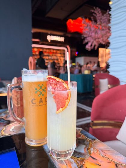 A close-up of the refreshing drinks at CAD Noida, showcasing the colorful and vibrant bar scene.