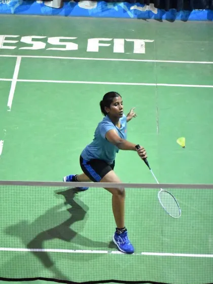 A player executing a forehand shot with precision and power, a fundamental skill honed through countless drills.