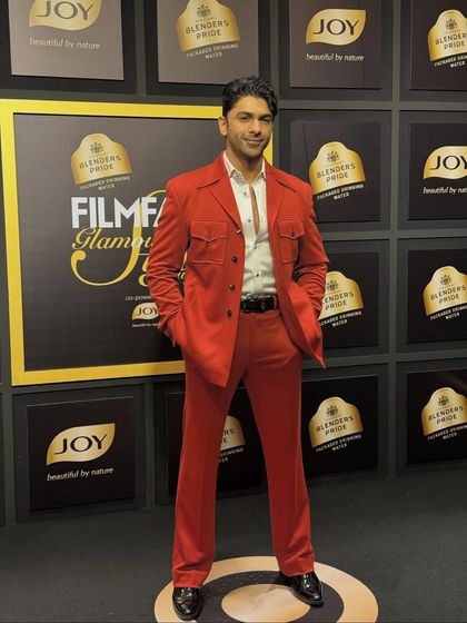 The vibrant color and sharp cut of this suit ensure you stand out in any crowd. It's a testament to our belief that personal style should be bold and unapologetic.