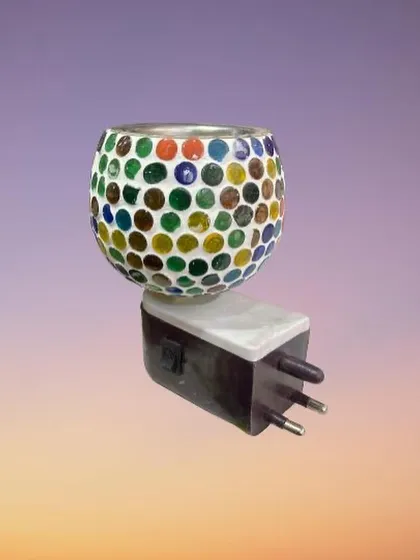 This image shows the back of our mosaic plug-in diffuser, displaying the standard three-pin plug and the on/off switch for easy operation. You can use it as just a lamp or as a diffuser.