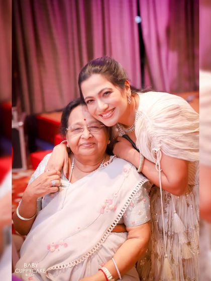 A heartwarming photo of a daughter with her mother. We believe in capturing the special connections between all family members during an event.