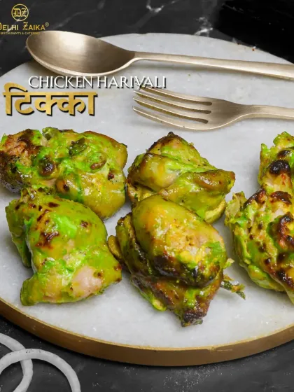 A closer look at our Chicken Hariyali Tikka. The green marinade beautifully chars on the grill, creating a smoky and fresh-tasting starter.