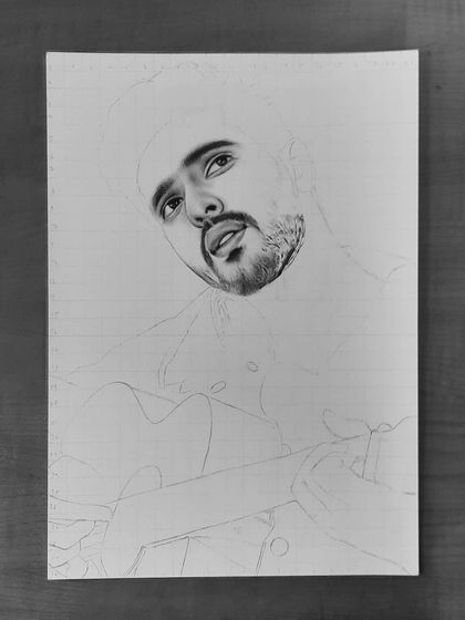 Follow the 90-hour journey of my Armaan Malik portrait. These progress shots show how I use the grid method to ensure accuracy and build up the face, hair, and clothing textures.