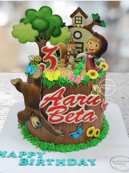 A fun Masha and the Bear cake set on a tree stump. This design brings the forest scene to life with Masha, the bear, a squirrel, and other woodland details.