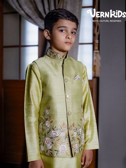 Another look at our sage green floral embroidered Bundi set. The soft silk fabric and delicate threadwork make it a luxurious and comfortable option for any special occasion.