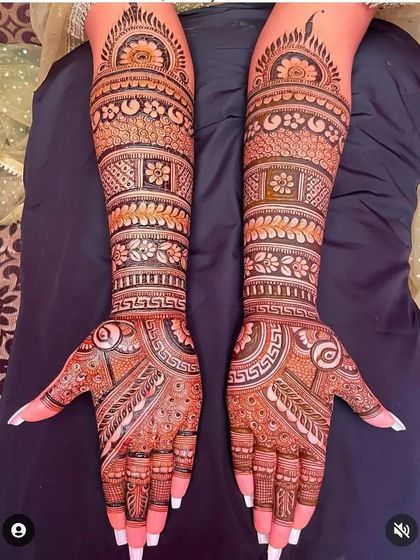 A classic, full-coverage design with traditional floral and geometric patterns, showing a rich, dark stain.