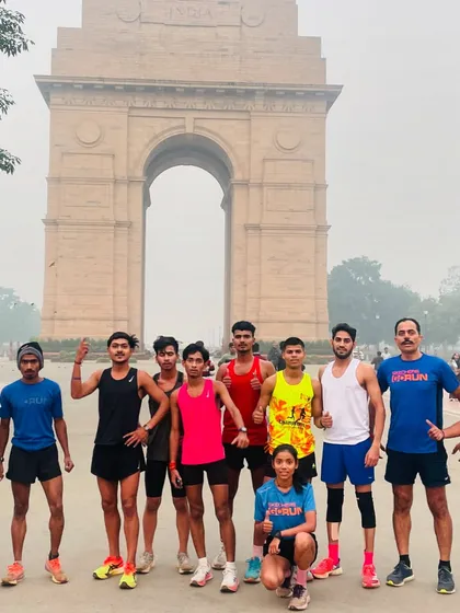 Our team posing proudly in front of India Gate after a long run from JLN Stadium. These runs are not just about training; they are about celebrating our city and our shared passion.