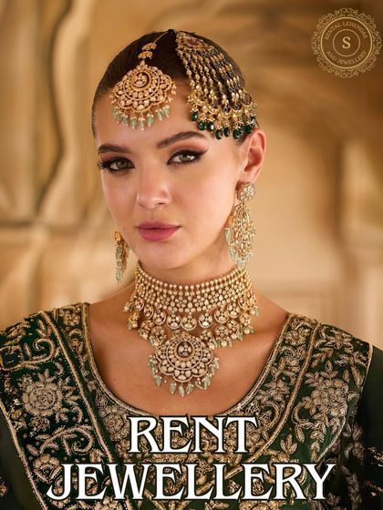 Wear the trend, own the moment with our designer jewellery. This model is wearing a heavy passa and choker set that beautifully complements her green embroidered outfit.